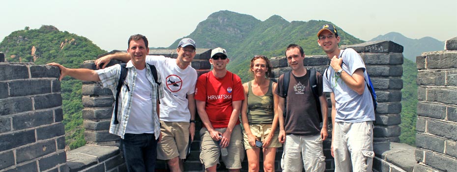 Auctiva staff members visit the Great Wall of China.